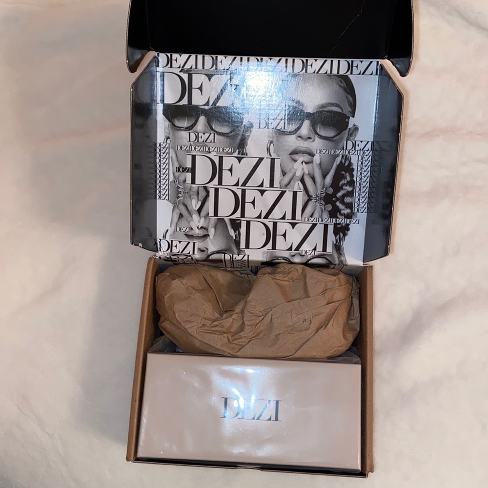 Dezi on read sunglasses